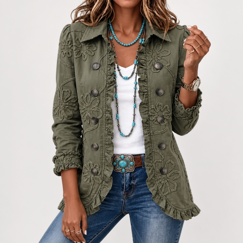 Front view of the olive green jacket worn open over a white top, showing raised floral embroidery, buttons and ruffled edges. 4