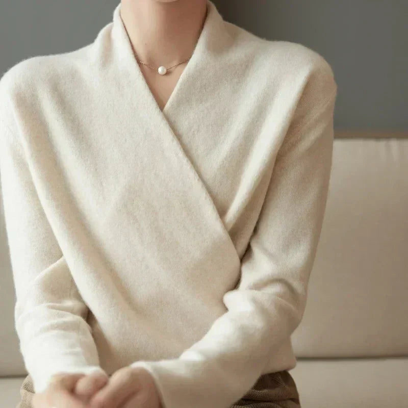 Close crop of the cream crossover front and V-neck, showing the soft brushed knit 15