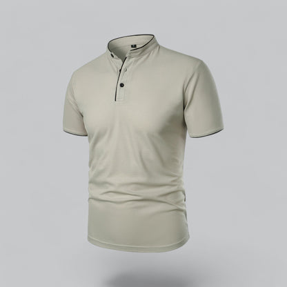 Angled three-quarter view of the pale stone shirt showing placket buttons and neckband piping 13