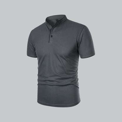 Angled three-quarter view of the dark grey shirt showing the buttoned placket and black piping 15