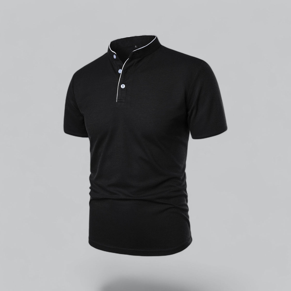 Angled three-quarter view of the black shirt showing white piping and pale buttons on the placket 17