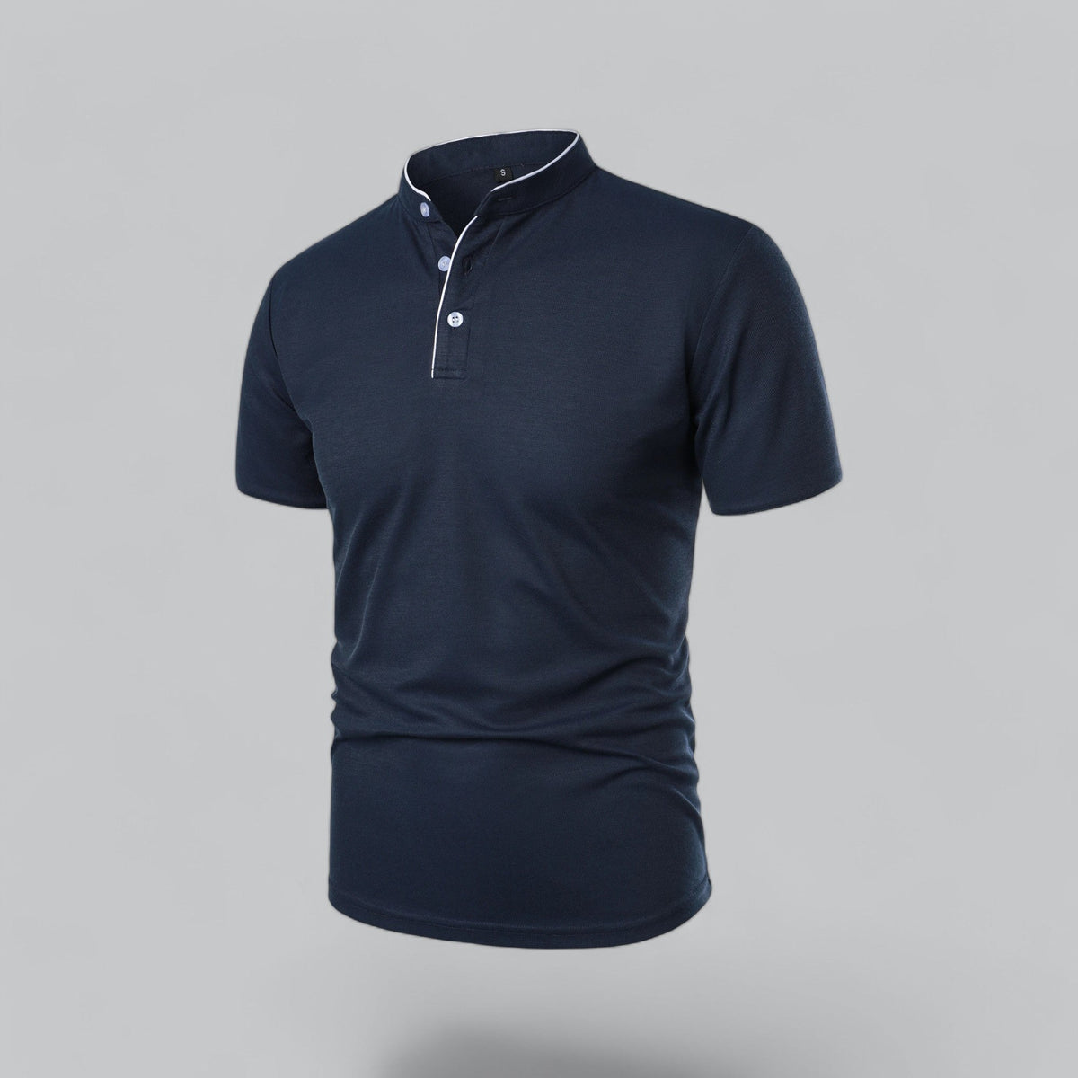 Angled three-quarter view of the navy shirt showing white piping and pale buttons on the placket 19