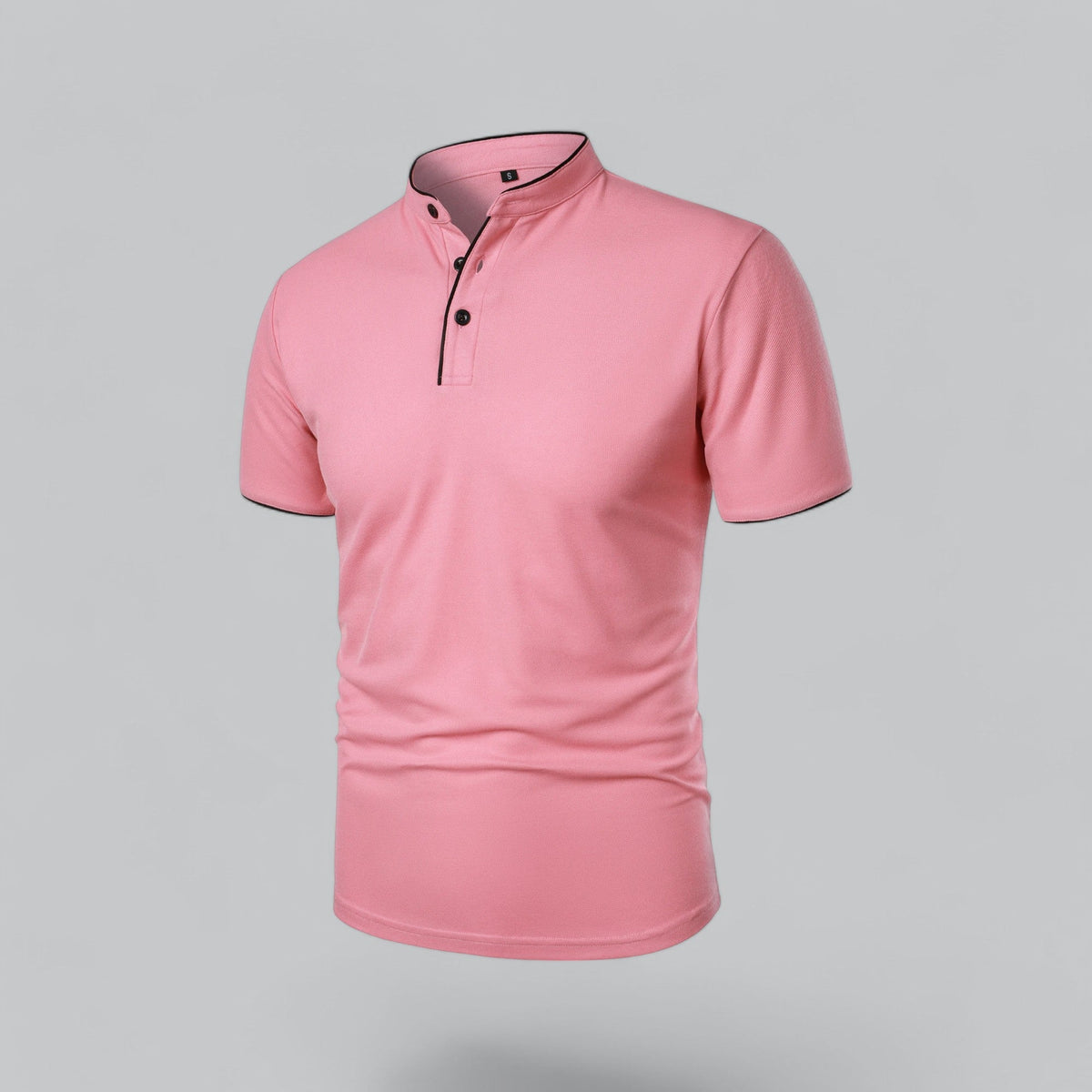 Pink polo shirt seen from the front at an angle, with black buttons and black piped neckband 23