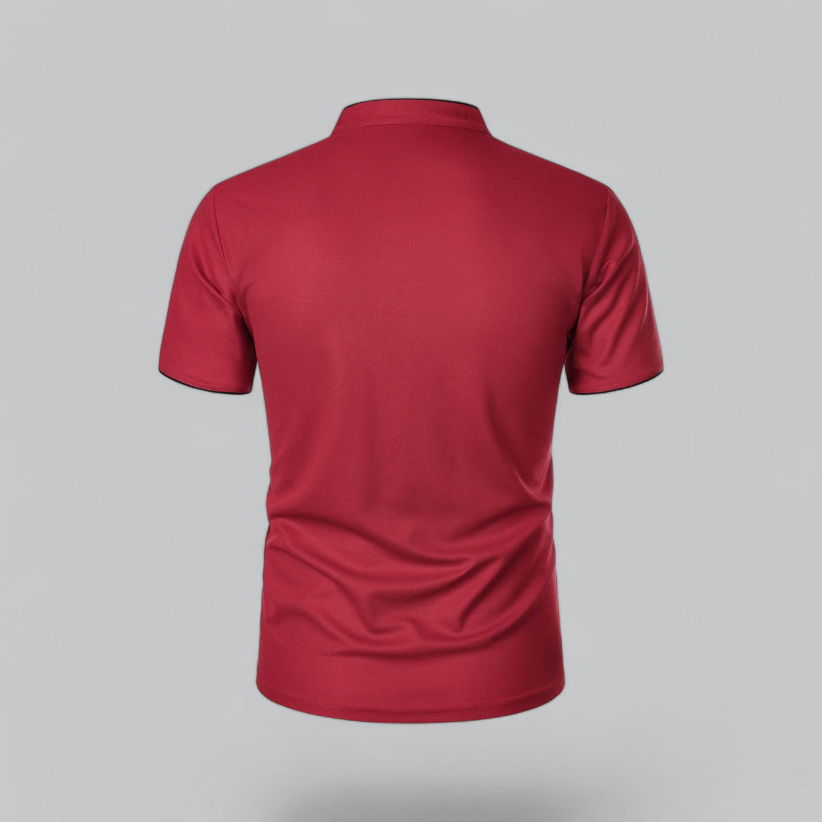 Back view of the red short-sleeved polo shirt, plain across the back with black-edged sleeve hems 26