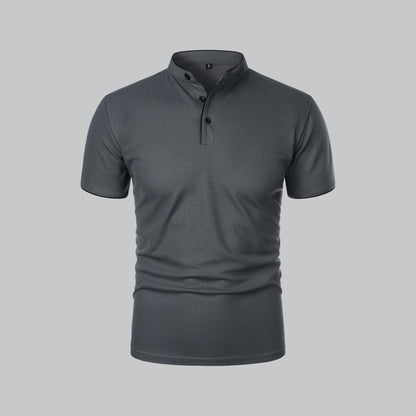 Front view of a dark grey short-sleeved shirt with stand-up neckband and black trim details 3
