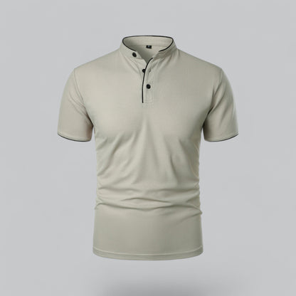 Front view of a pale stone-coloured short-sleeved shirt with black piping and three black buttons 2
