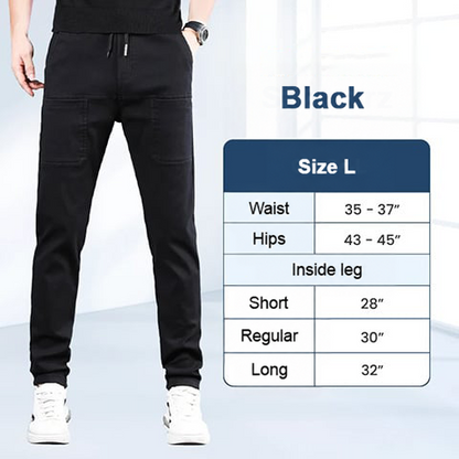 Black trousers on a model next to a size L chart for waist, hips and inside leg 6