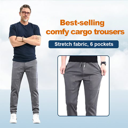 Smiling man in a navy t-shirt and grey trousers, with an inset close-up of the pockets 11