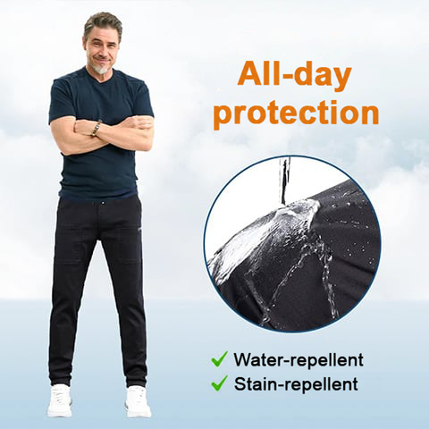 Man in black trousers beside a close-up of water beading on the dark fabric 14