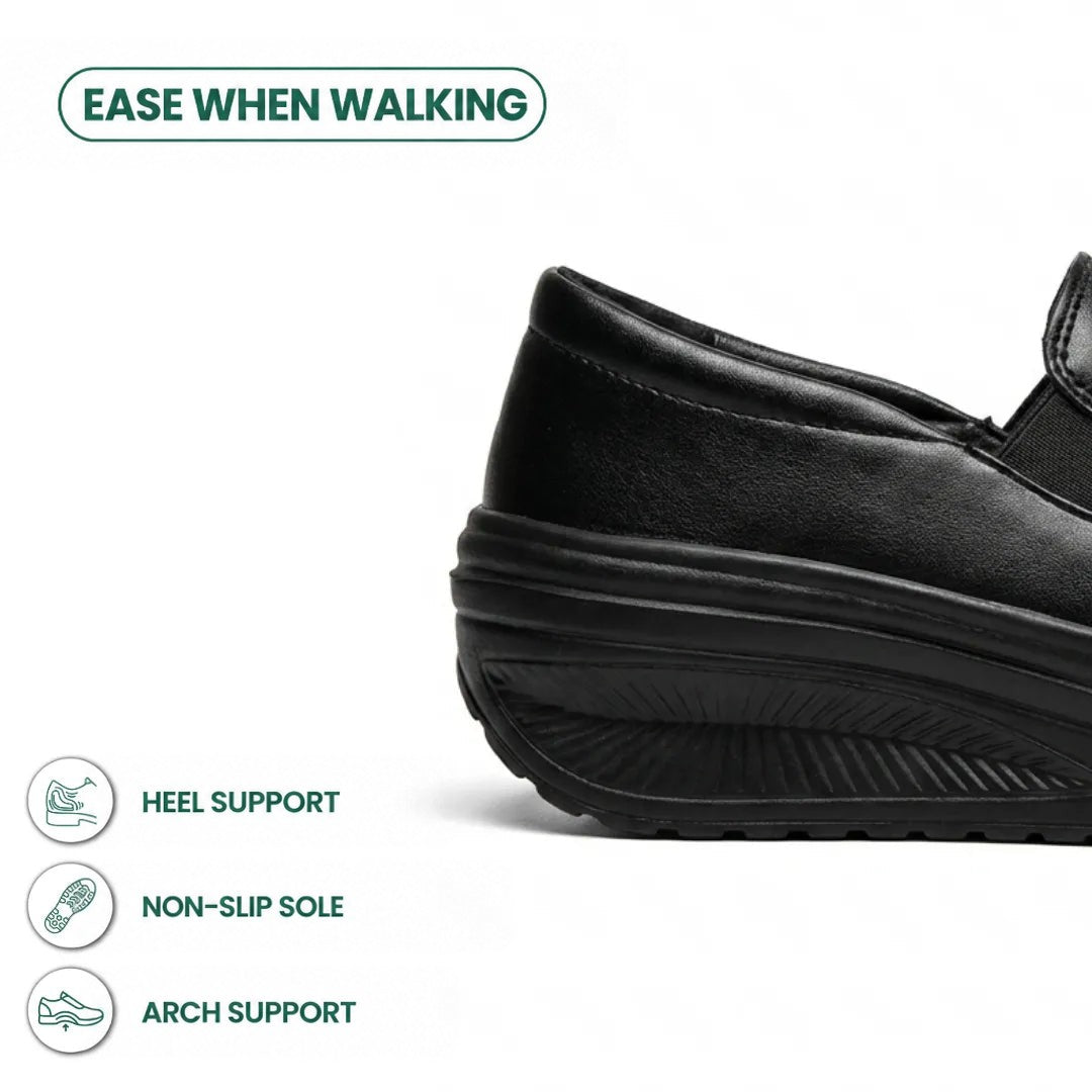 Close-up of the black shoe's heel and tread, with icons for heel support and grip 4