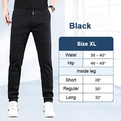 Black trousers on a model next to a size XL chart for waist, hips and inside leg 7