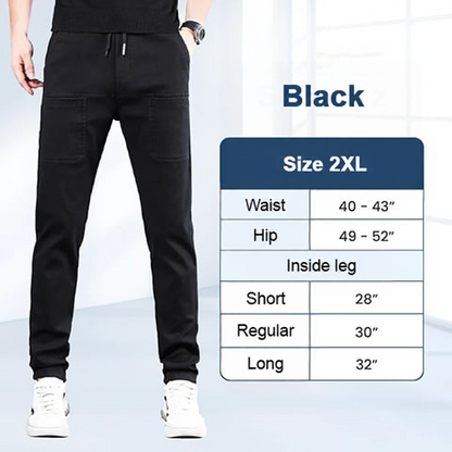 Black trousers on a model next to a size 2XL chart for waist, hips and inside leg 8