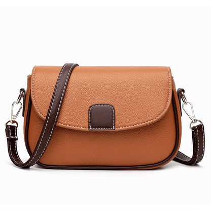 Orange-tan crossbody bag with dark brown strap and trim, photographed front-on on a white background 7