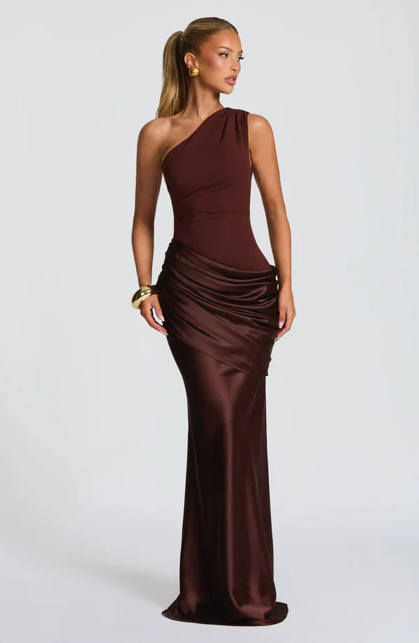 Dark chocolate brown dress worn by a blonde model with a gold bangle, shown at an angle. 8
