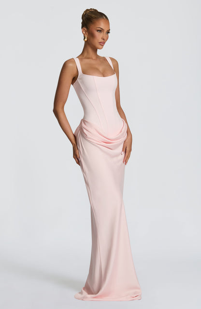 Light pink maxi dress seen from the side, showing the corset seams and the swag of draped fabric 14