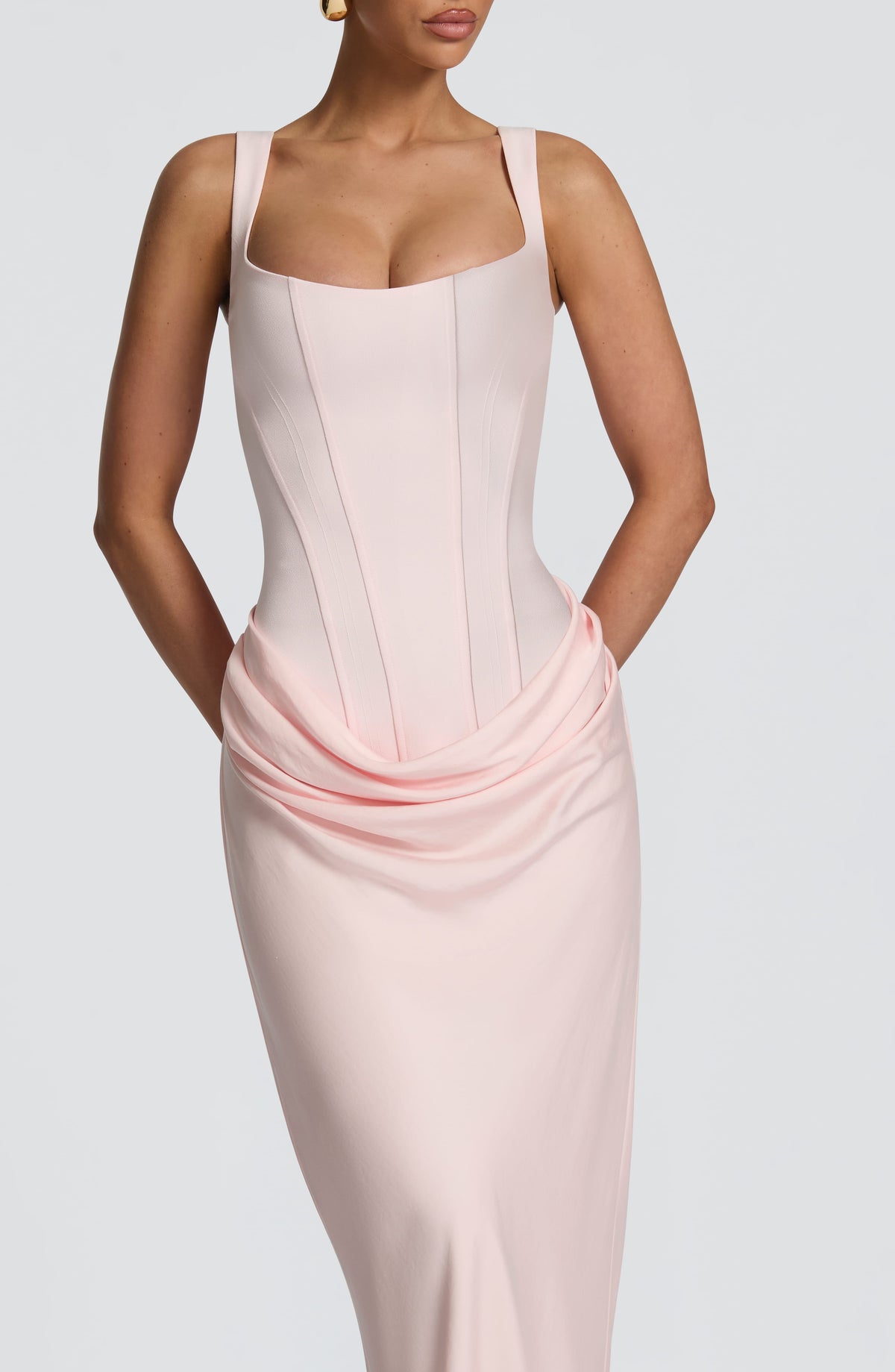Close-up of the pink dress's corset bodice, wide straps and softly draped hip ruching 16