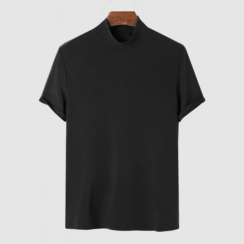 Black mock-neck tee hanging on a wooden hanger, seen from the front with the short sleeves turned up at the cuffs. 5