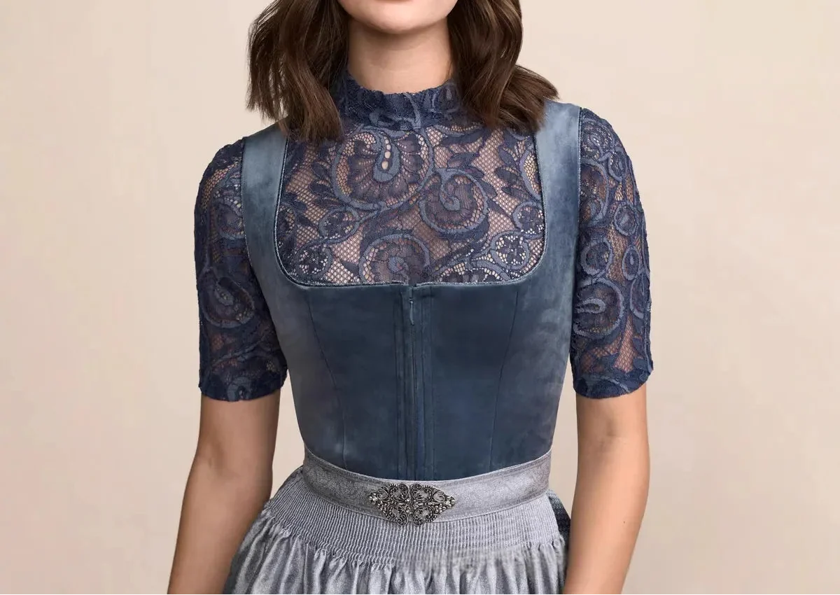 Close-up of the fitted velvety bodice with a square neckline, blue lace blouse, central zip and ornate silver clasp at the waistband. 2