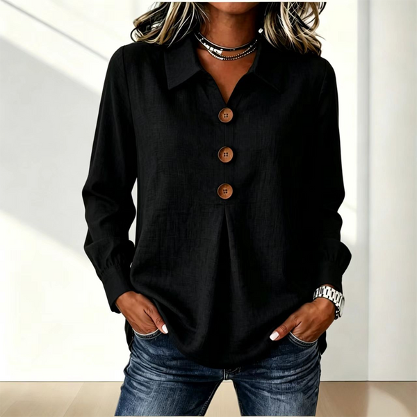 Black version of the shirt styled with jeans and a layered necklace 4