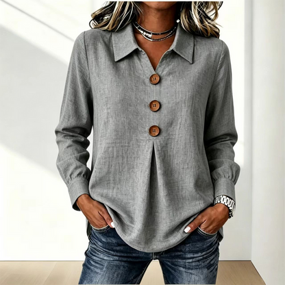 Grey version of the shirt worn with jeans, hands in pockets 8