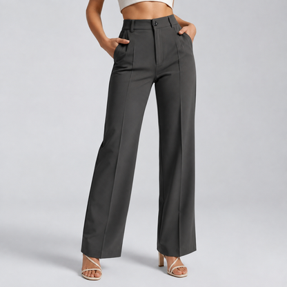 Dark grey trousers on a model with both hands in the front pockets, front view 10