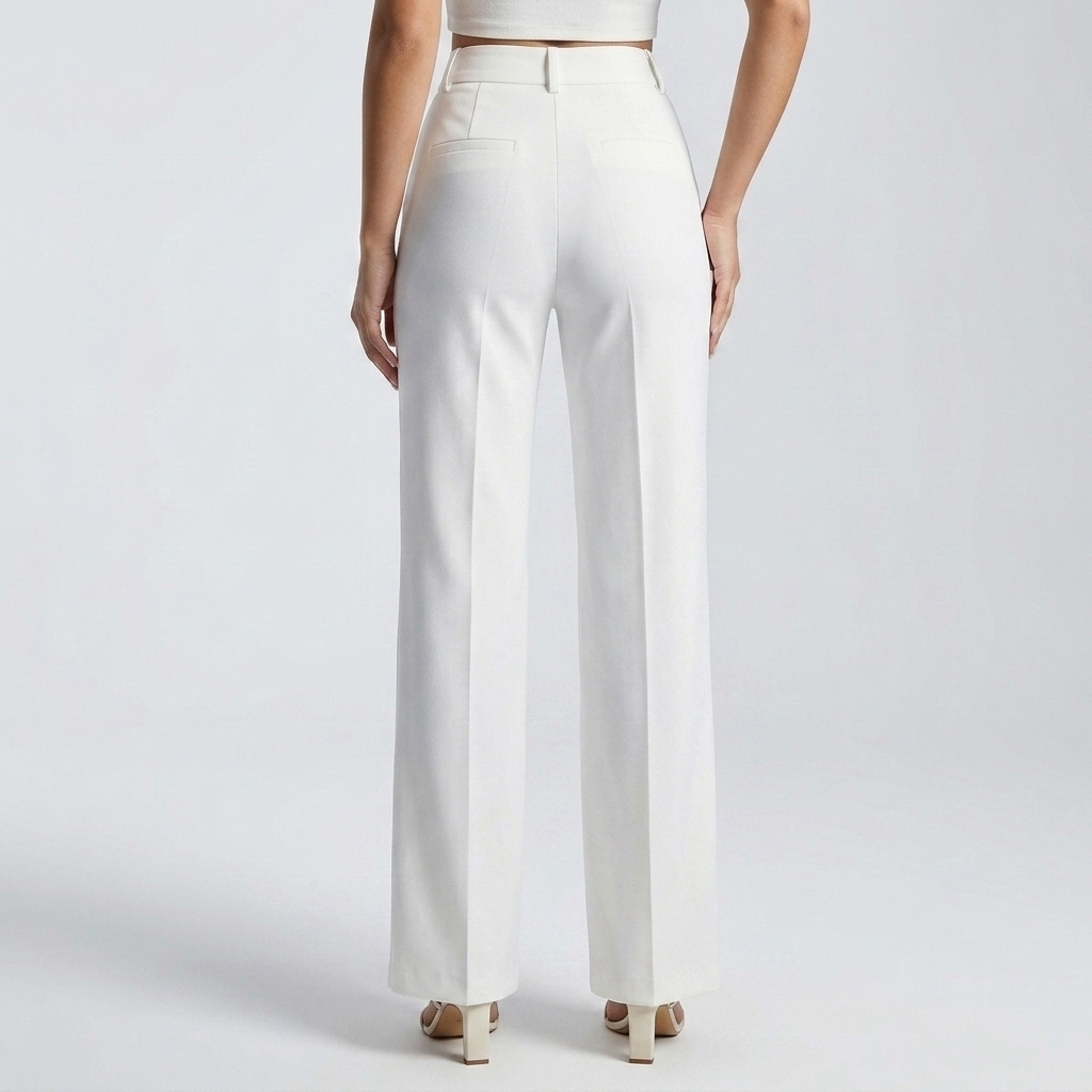 Back view of white trousers on a model, showing two back welt pockets and a centre crease 3