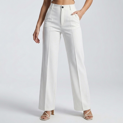 Front view of white straight-leg trousers on a model with one hand in the pocket 8