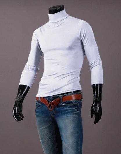 White high neck top styled on a headless mannequin with blue jeans and a tan leather belt 11
