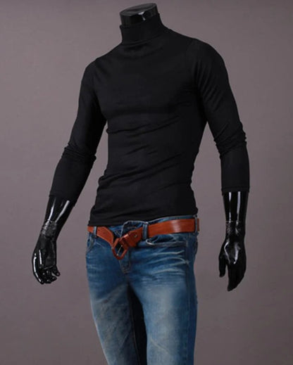 Black high neck top styled on a headless mannequin with blue jeans and a tan leather belt 10