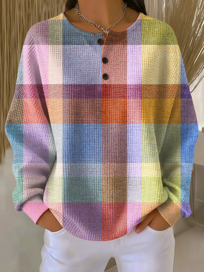Waffle knit henley jumper in a multicoloured check of pink, blue, orange, yellow and green blocks 9