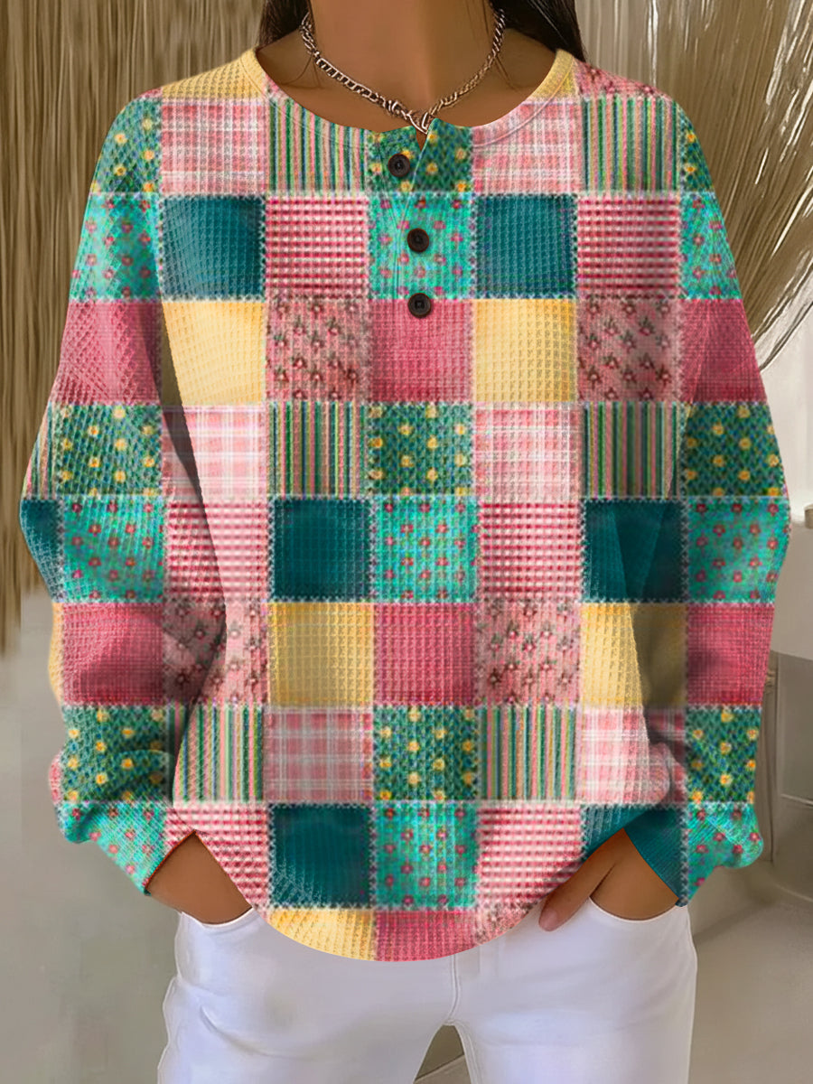 Waffle knit henley jumper in a bright patchwork square print of pink, teal, yellow and floral patches 20