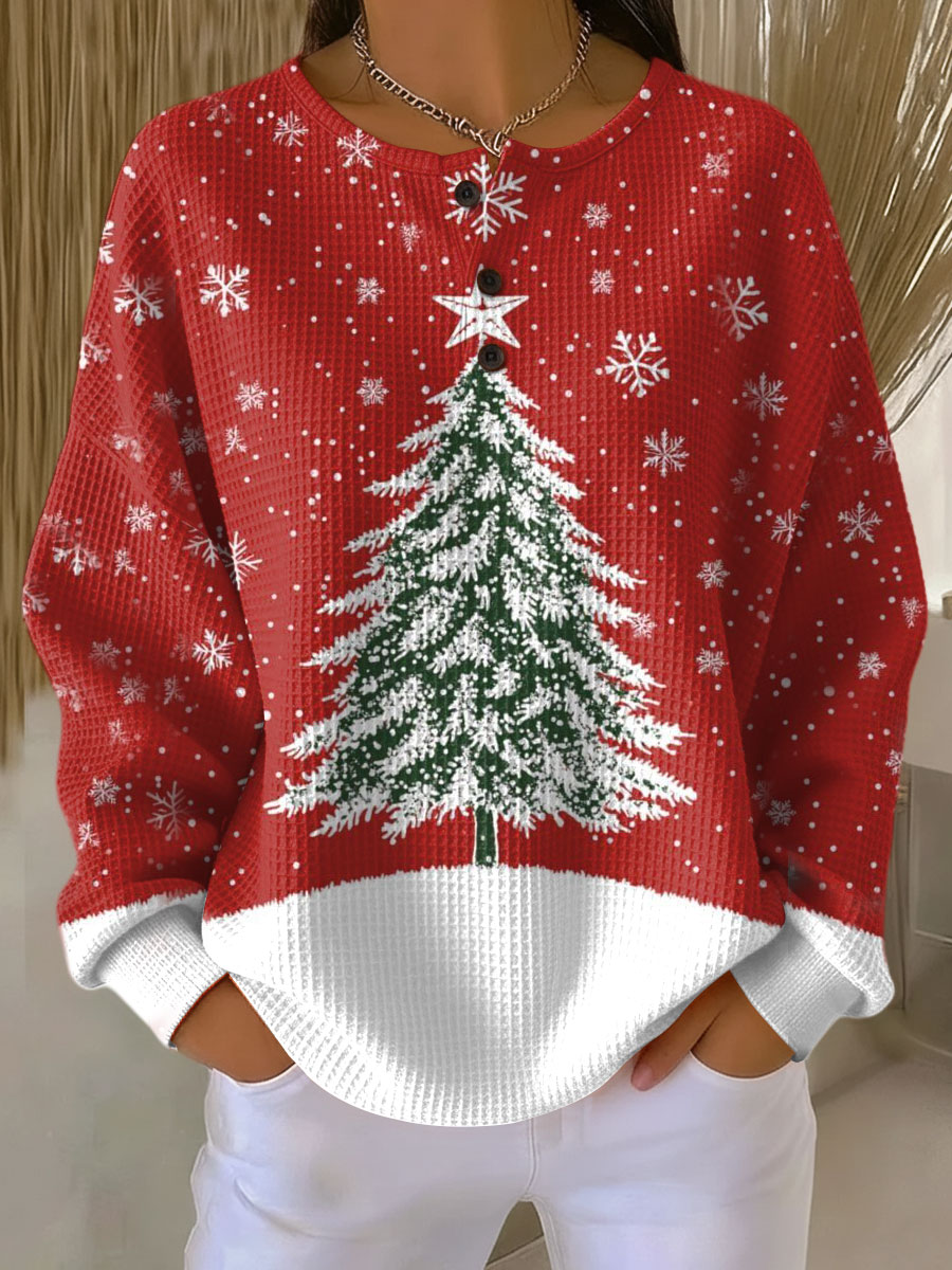 Red waffle knit jumper with a snow-covered Christmas tree, falling snowflakes and a white hem and cuffs 18