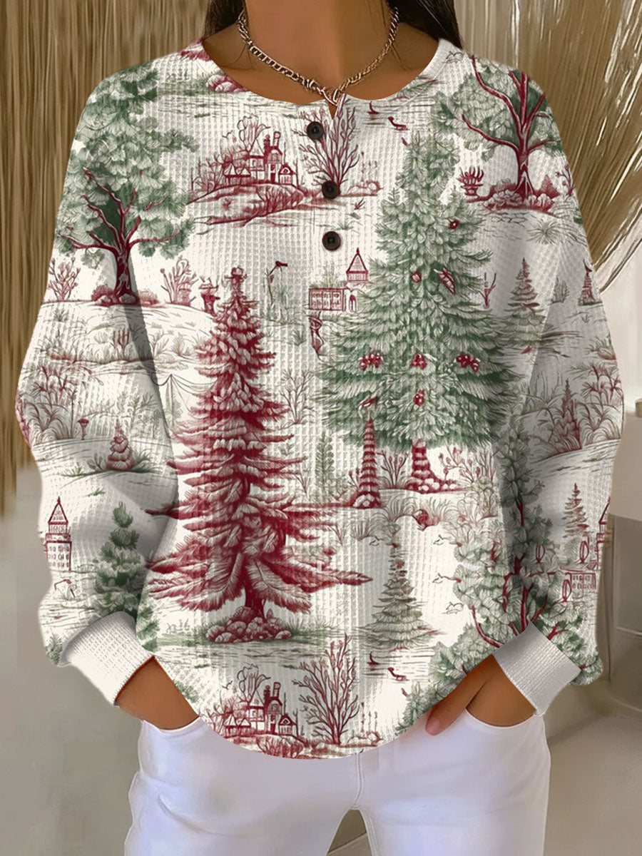 Cream waffle-knit button-neck jumper printed with red and green festive trees and cottages in a woodland scene 22