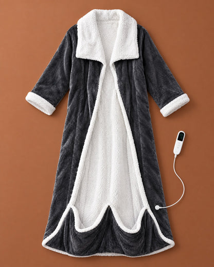 Flat lay of the open dark grey fleece robe with white sherpa lining, collar and cuffs, foot pocket and white controller beside it. 1