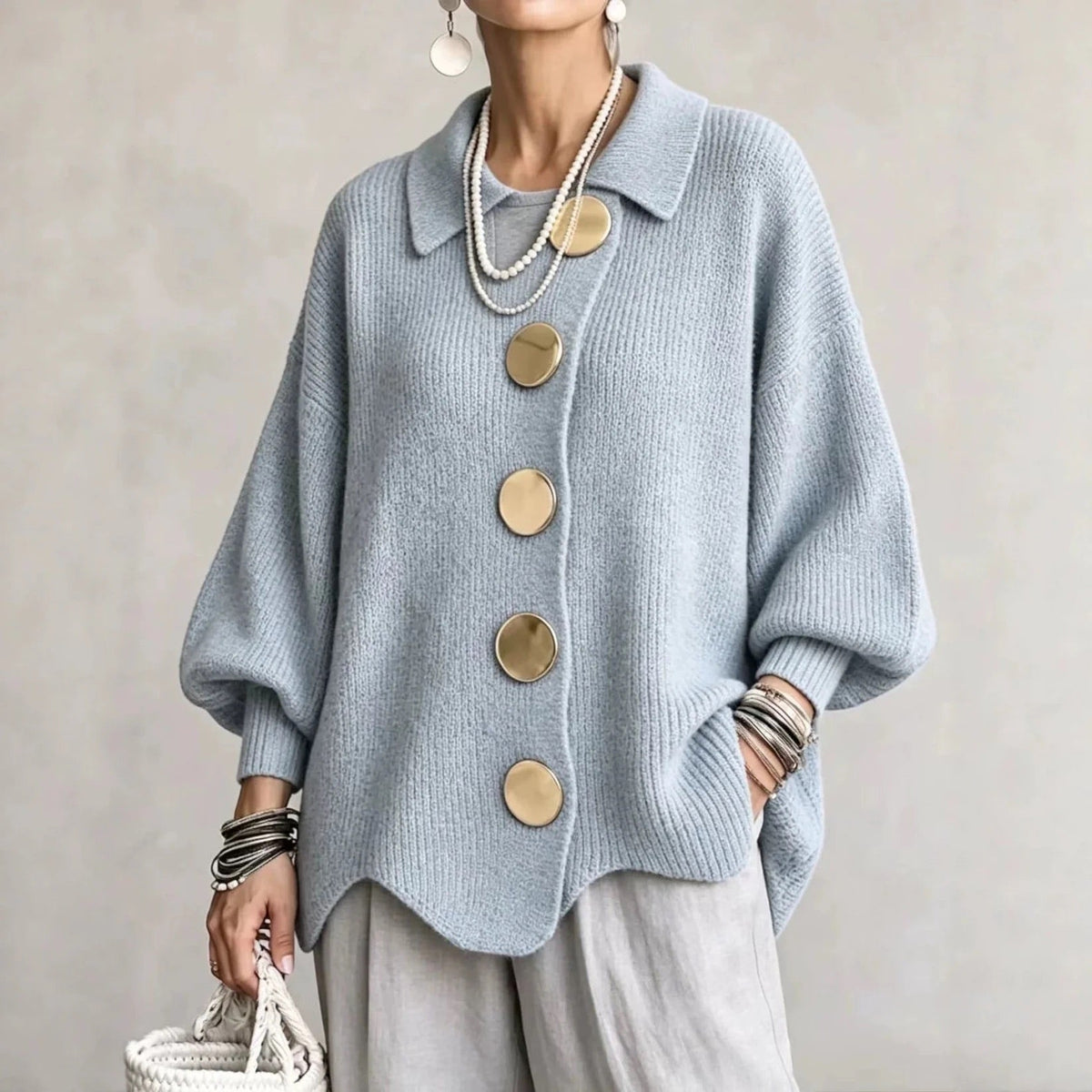 Pale blue version worn with grey linen trousers and a white woven handbag 5