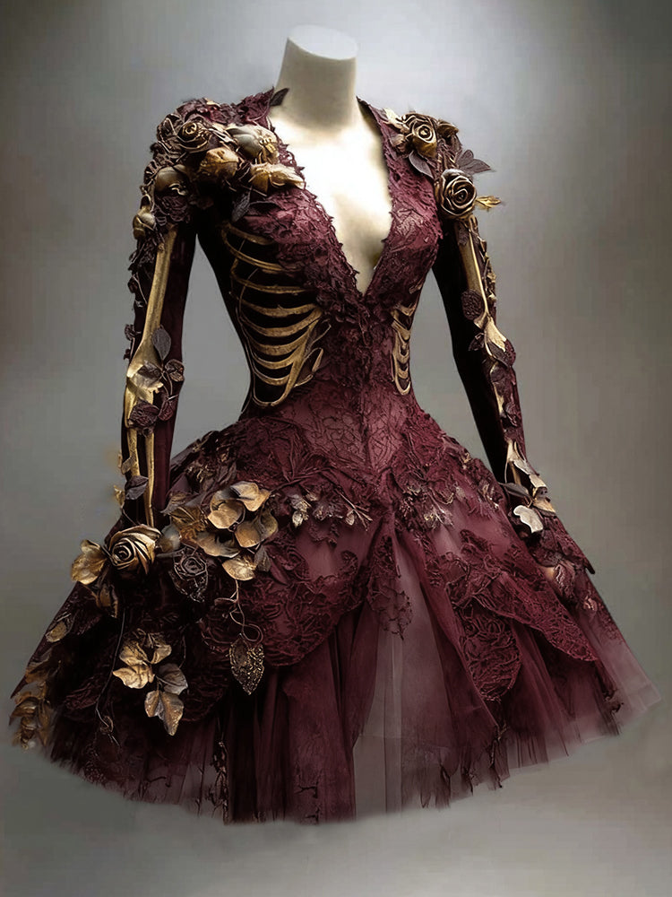 Burgundy version on a mannequin, showing the deep V-neck, golden ribcage print, lace bodice, gold roses and layered tulle skirt. 2
