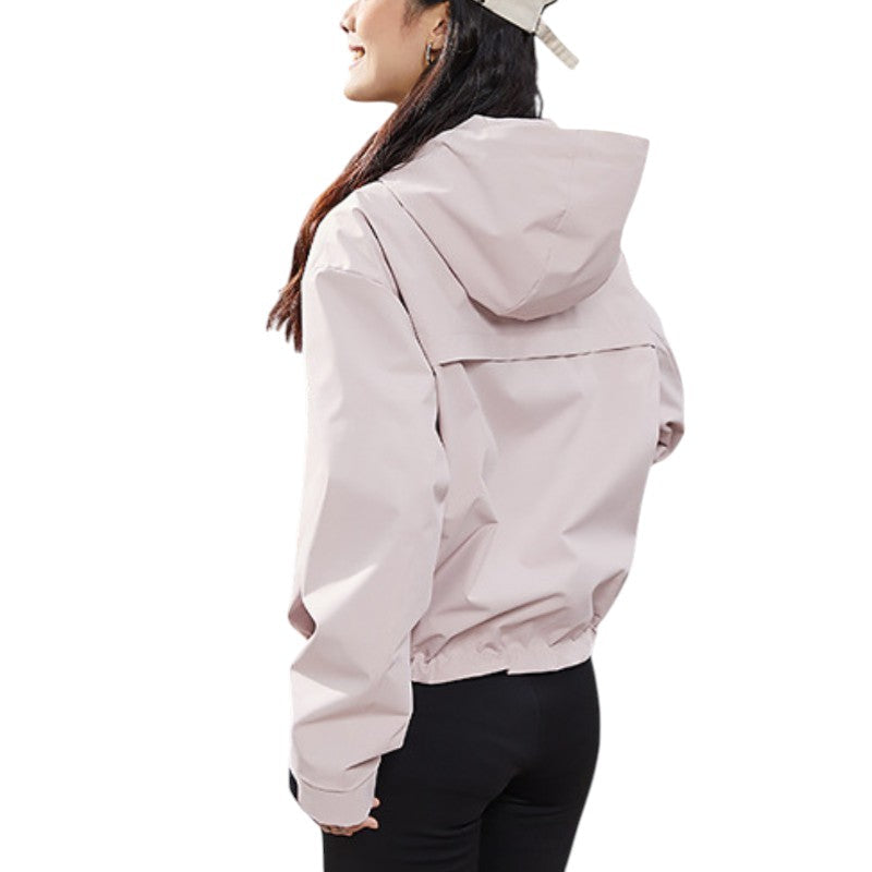 Back view of the dusty pink jacket showing the hood, the seam across the back and the gathered elastic hem. 12