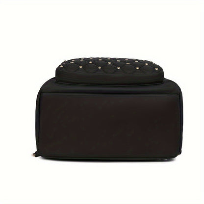Underside of the black backpack, showing the flat base and the bottom of the quilted studded front pocket 8