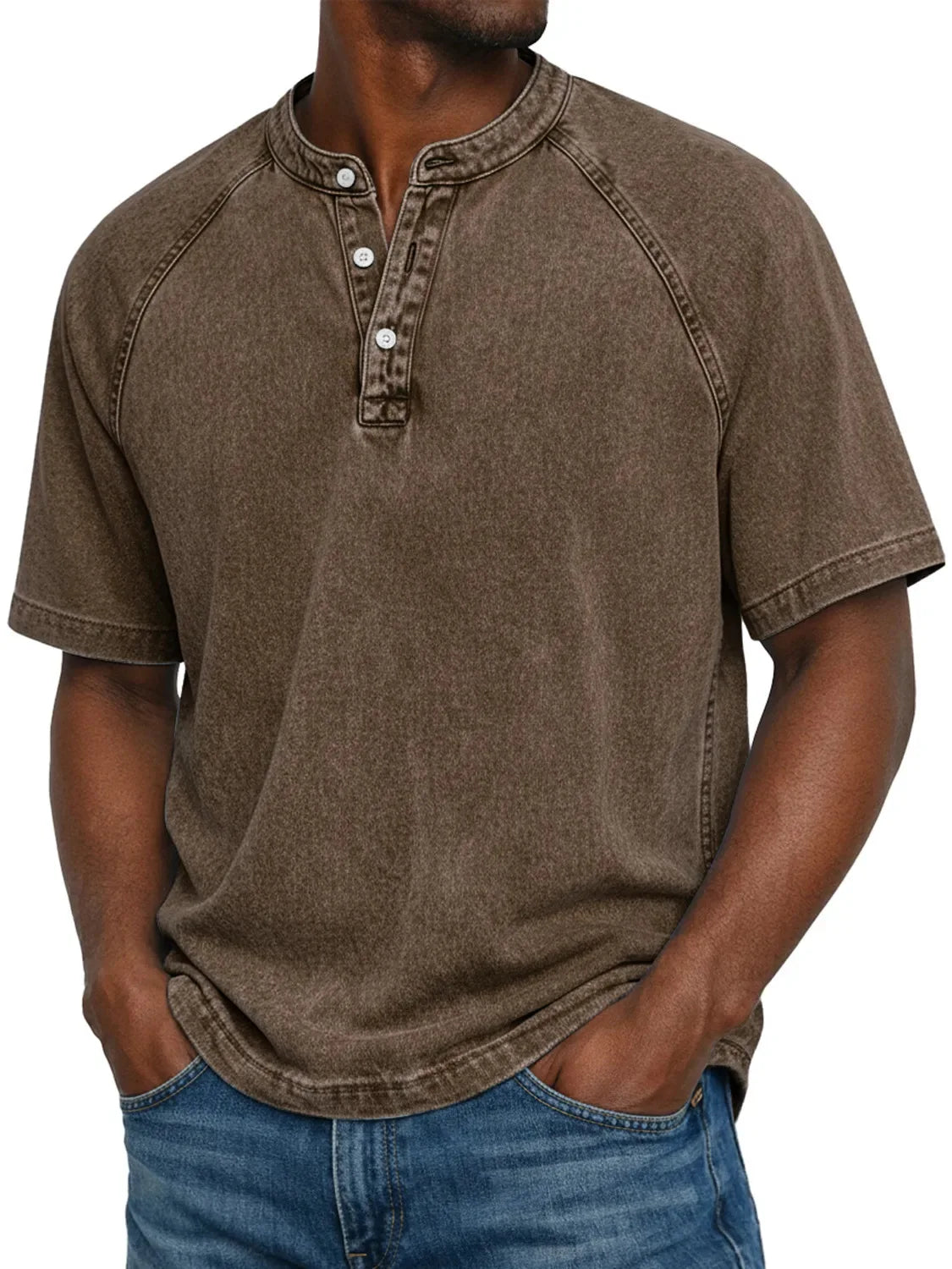 Man wearing the short-sleeved raglan Henley in washed coffee brown, front view with three buttons and contrast-washed seams. 8