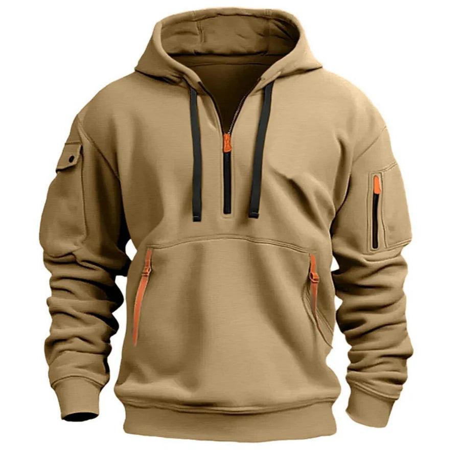 Front view of the khaki quarter-zip hoodie with black drawstrings and orange zip pulls 2