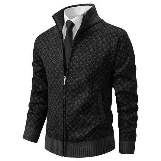 Black diamond-patterned zip cardigan with grey ribbed cuffs and hem, styled over a white shirt and tie 1