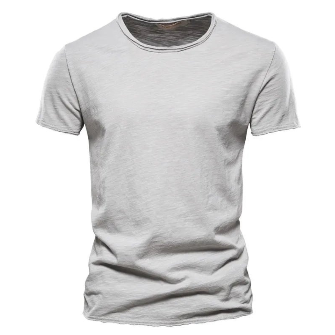 Front view of the short-sleeved crew neck t-shirt in light grey, showing the slubby fabric and neat raw-edged collar. 4