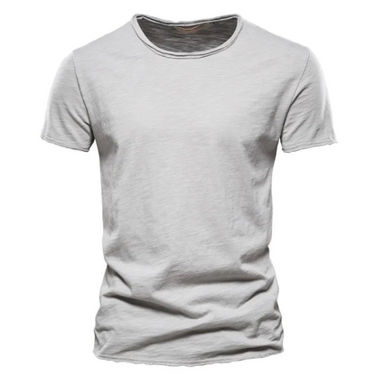 Front view of the short-sleeved crew neck t-shirt in light grey, showing the slubby fabric and neat raw-edged collar. 4