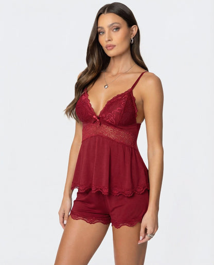 Deep red set worn by a model, angled view showing the lace bust and waist panel 6