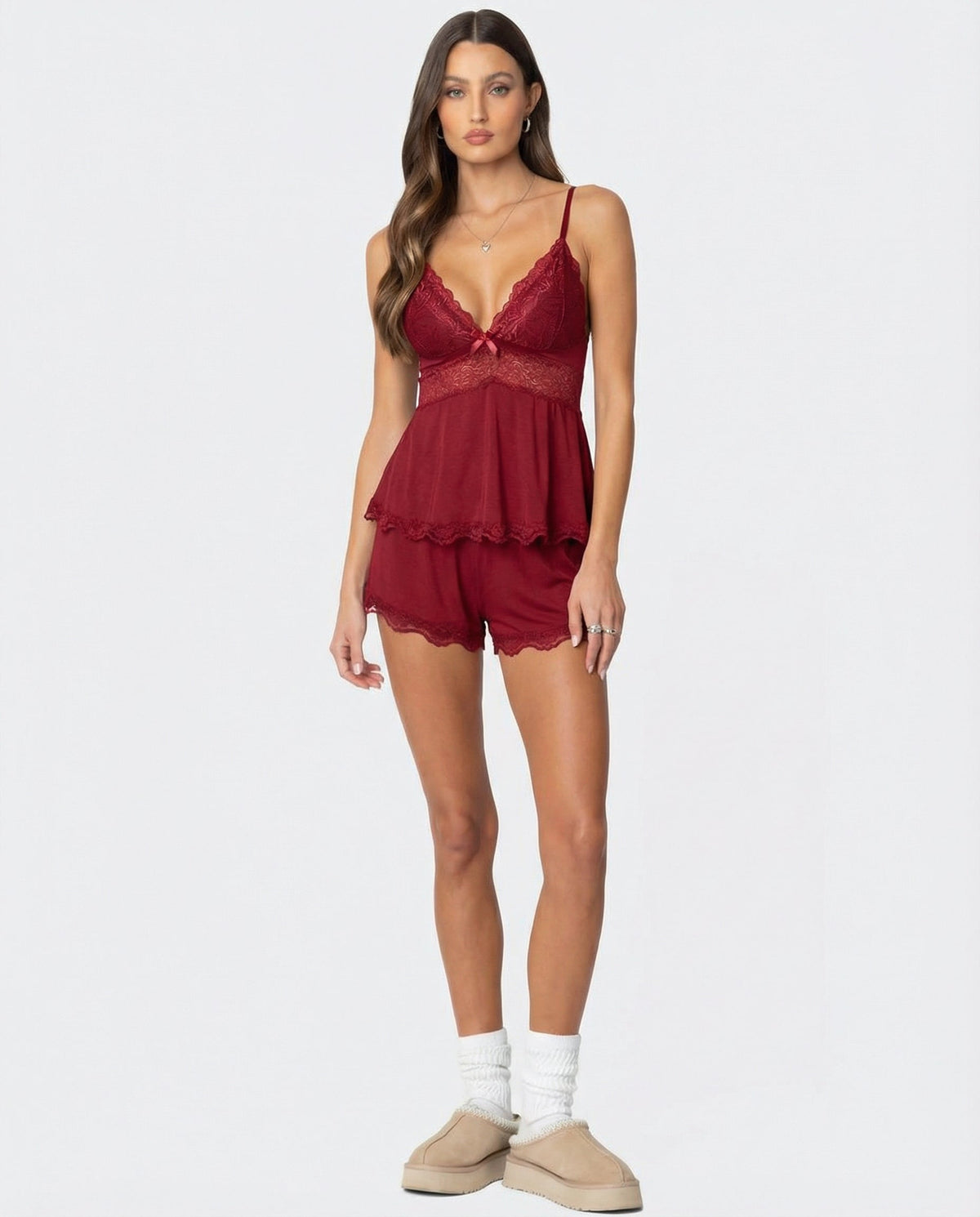 Full-length view of the red set, worn with white slouchy socks and beige platform slippers 8