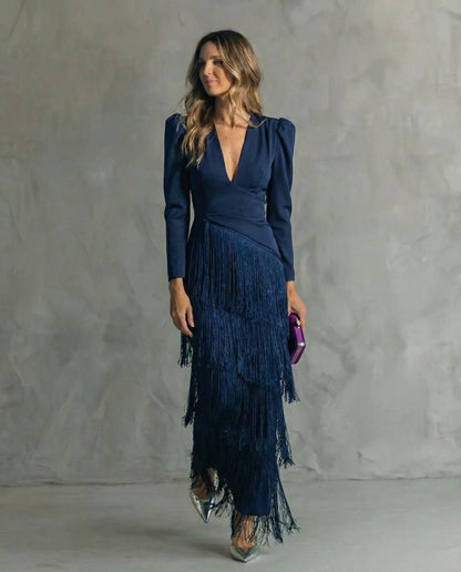 Navy blue version of the long-sleeved dress with a wrap-style bodice and tiered fringe skirt 6