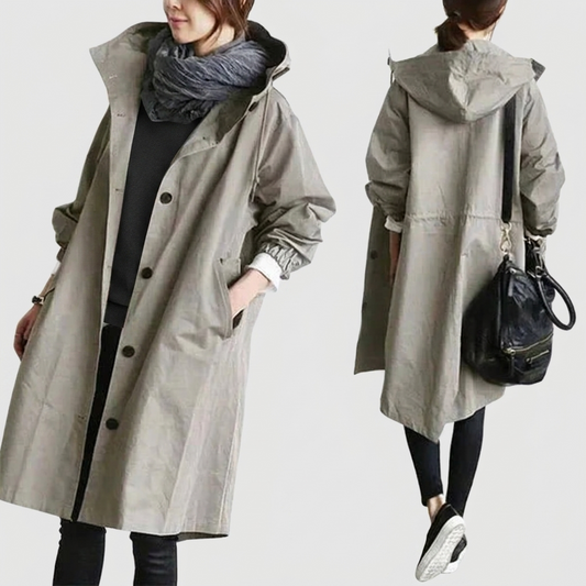 Two views of a stone-grey buttoned hooded coat: front worn open over a dark jumper with scarf, and back with hood and drawstring waist. 1