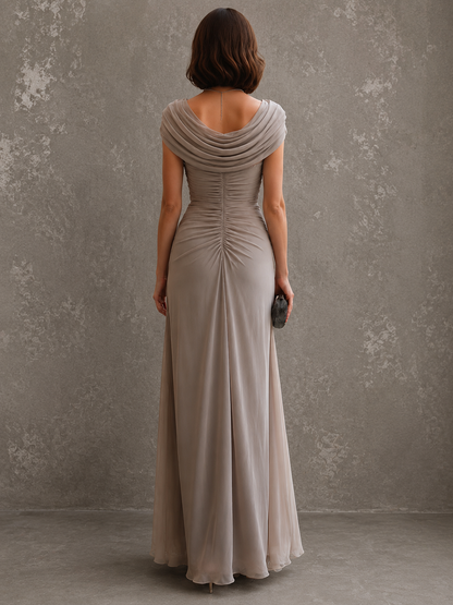 Back view of the taupe gown, showing the draped cowl back, centre ruching down the spine and the long straight chiffon skirt. 9