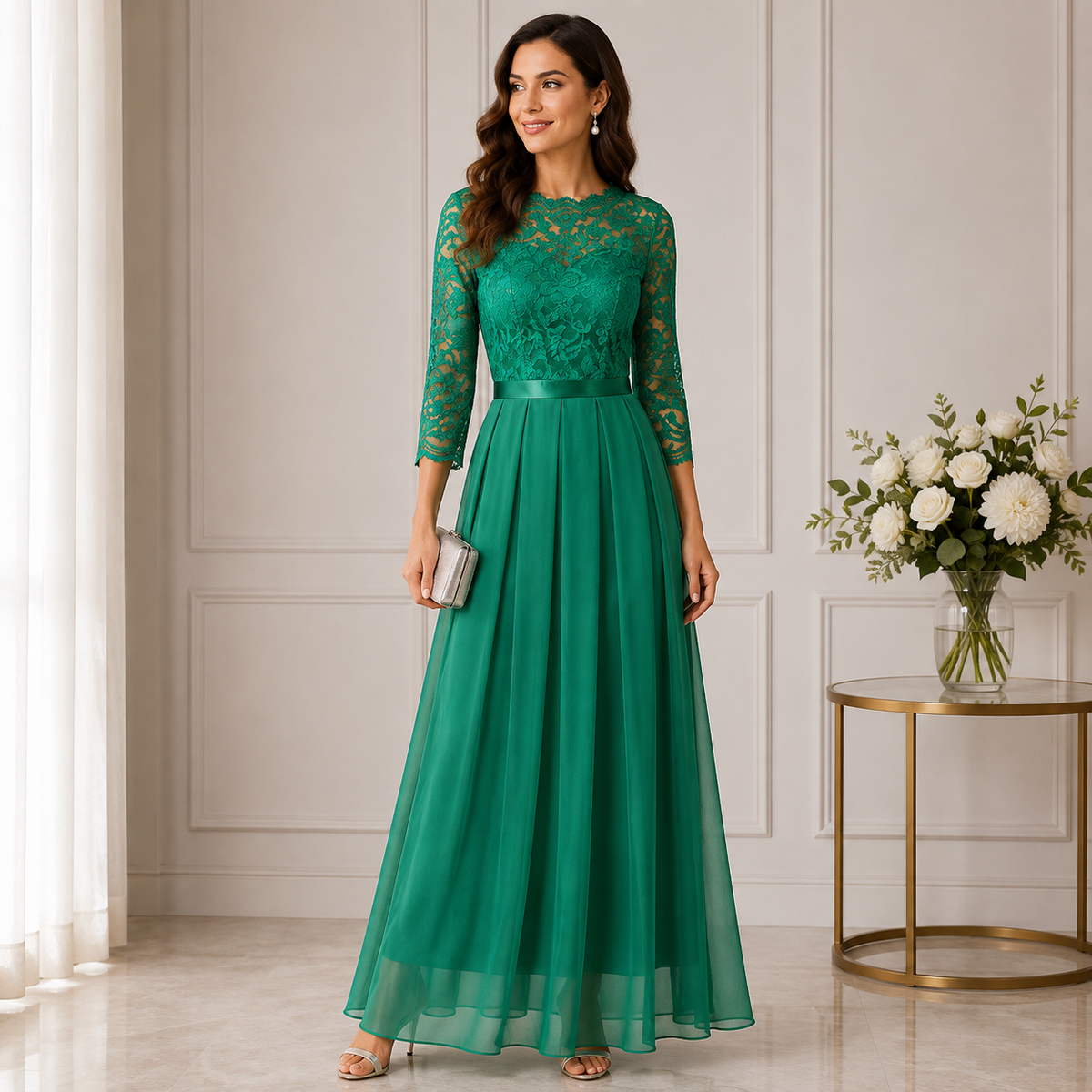 Model in the emerald green maxi dress with lace bodice, three-quarter sleeves and chiffon skirt 1