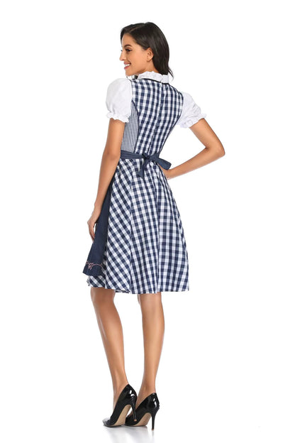 Back view of a navy and white gingham dirndl with a navy apron bow, puff sleeves and a ruffled collar. 6